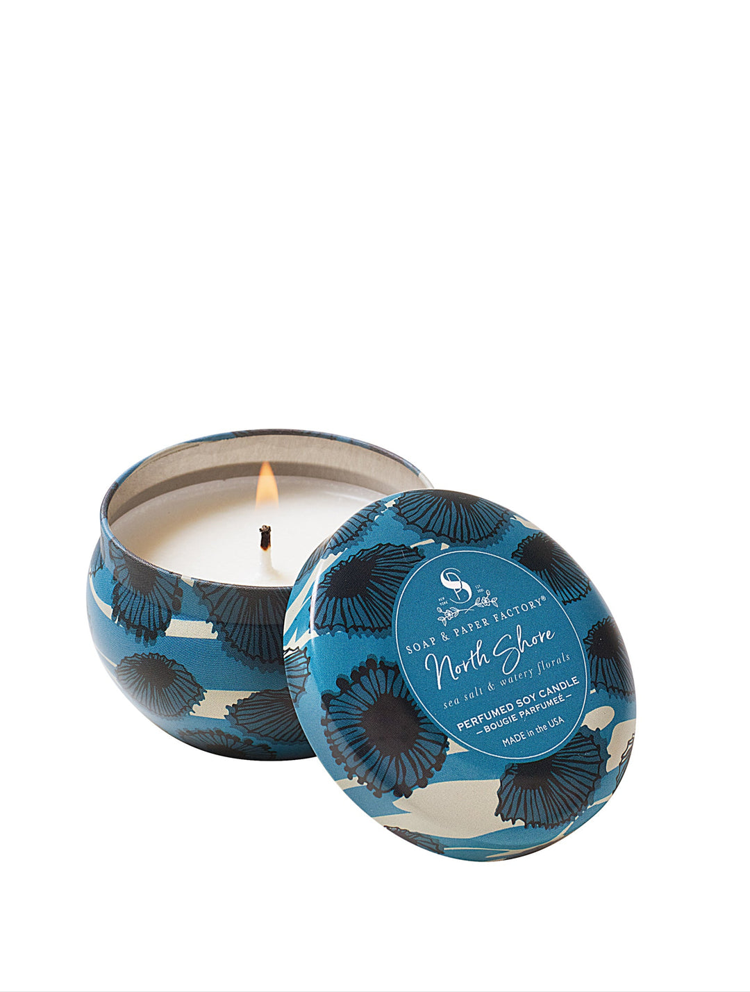 North Shore features deeply layered notes of sea salt & lush, watery florals. This 3 oz tin soy candle burns clean for up to 18 hours. Perfect for travel!