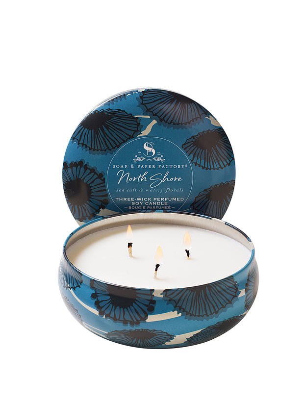 North Shore features deeply layered notes of sea salt & lush, watery florals. This 13 oz three-wick tin soy candle burns clean for up to 32 hours. Perfect for travel! 