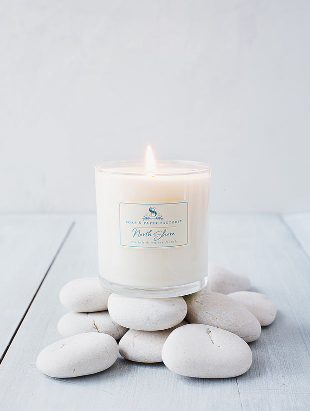 North Shore soy candles feature deeply layered notes of sea salt & lush, watery florals that will transport you to the edge of the sea with crashing waves, hot sun and sandy beaches. This single-wick soy candle burns clean and bright for up to 65 hours.