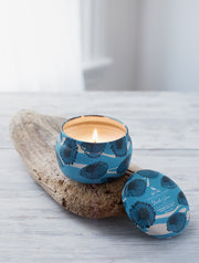 North Shore features deeply layered notes of sea salt & lush, watery florals. This 3 oz tin soy candle burns clean for up to 18 hours. Perfect for travel! 