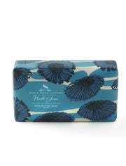  North Shore features deeply layered notes of sea salt & lush, watery florals that will transport you to the edge of the sea with crashing waves, hot sun and sandy beaches. Our extra-gentle 100% vegetable soap is enriched with nourishing Shea Butter for a creamy and luxurious lather.