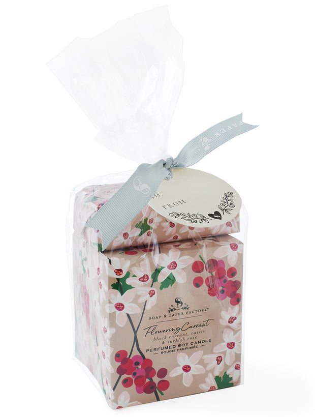 Assembled by hand in a clear bag with a custom ribbon and gift tag, our Large Soy Candle & Soap Set is ready for giving!! Flowering Currant offers fruity and tart notes of Currant and Cassis, blended with deep, sultry and Floral Turkish Rose to create a beautiful, exotic blend. Our Large Soy Candle & Soap Gift Set is available in all of our unique fragrances!Compare to Votivo Red Currant.