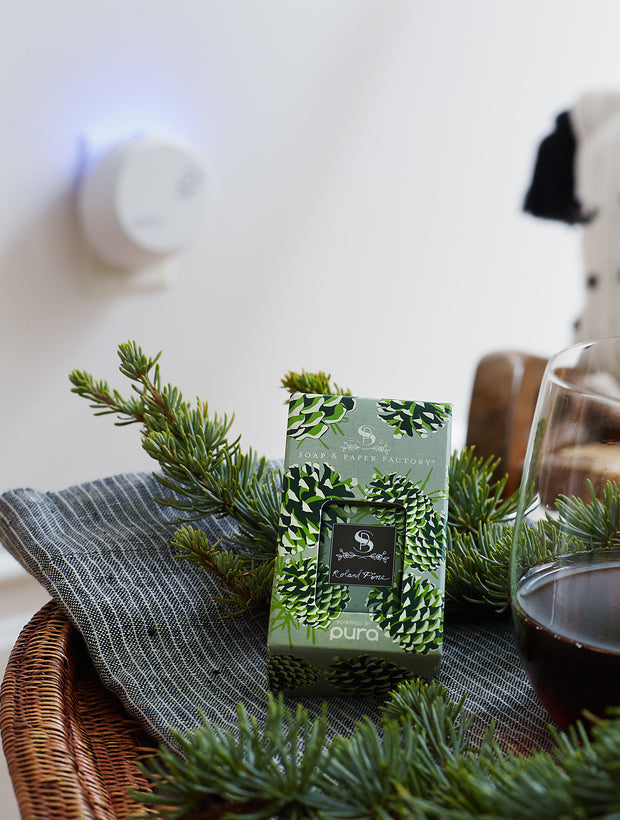 Compare with Thymes Fraiser Fir. Transform your environment with the fresh, festive fragrance of Roland Pine with our Soap & Paper Factory x Pura Smart Home Fragrance Diffuser Refill! Notes of Siberian Fir, Pine and Cilantro will fill your space with the uplifting, fresh scent of fresh cut pine boughs. This refill is for use with the Pura Smart Home Diffuser.