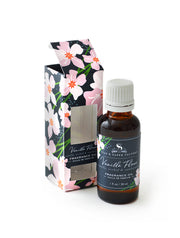 Vanilla Fleur fragrance oil is made from Vanilla bean, Orchid and Sandalwood. It's earthy, not a sweet foody vanilla . The oil is for plug in diffusers, wax melters and humidifiers.  A few drops in a hot tub is nice too. The oil is 1oz, and comes in a decorative box  with our signature design for Vanilla Fleur.  Whimsy vanilla orchids on a bold navy background.  Bottle is safely sealed and amber in color. Made in USA