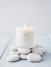 North Shore soy candles feature deeply layered notes of sea salt & lush, watery florals that will transport you to the edge of the sea with crashing waves, hot sun and sandy beaches. This single-wick soy candle burns clean and bright for up to 65 hours.