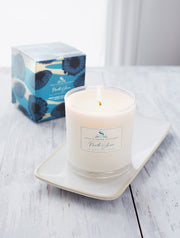 North Shore soy candles feature deeply layered notes of sea salt & lush, watery florals that will transport you to the edge of the sea with crashing waves, hot sun and sandy beaches. This single-wick soy candle burns clean and bright for up to 65 hours.